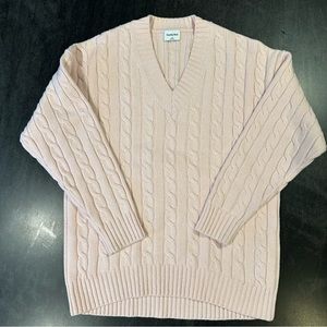 Sunday Best Peggy V-Neck
Merino Wool Cable Knit Sweater by Aritzia